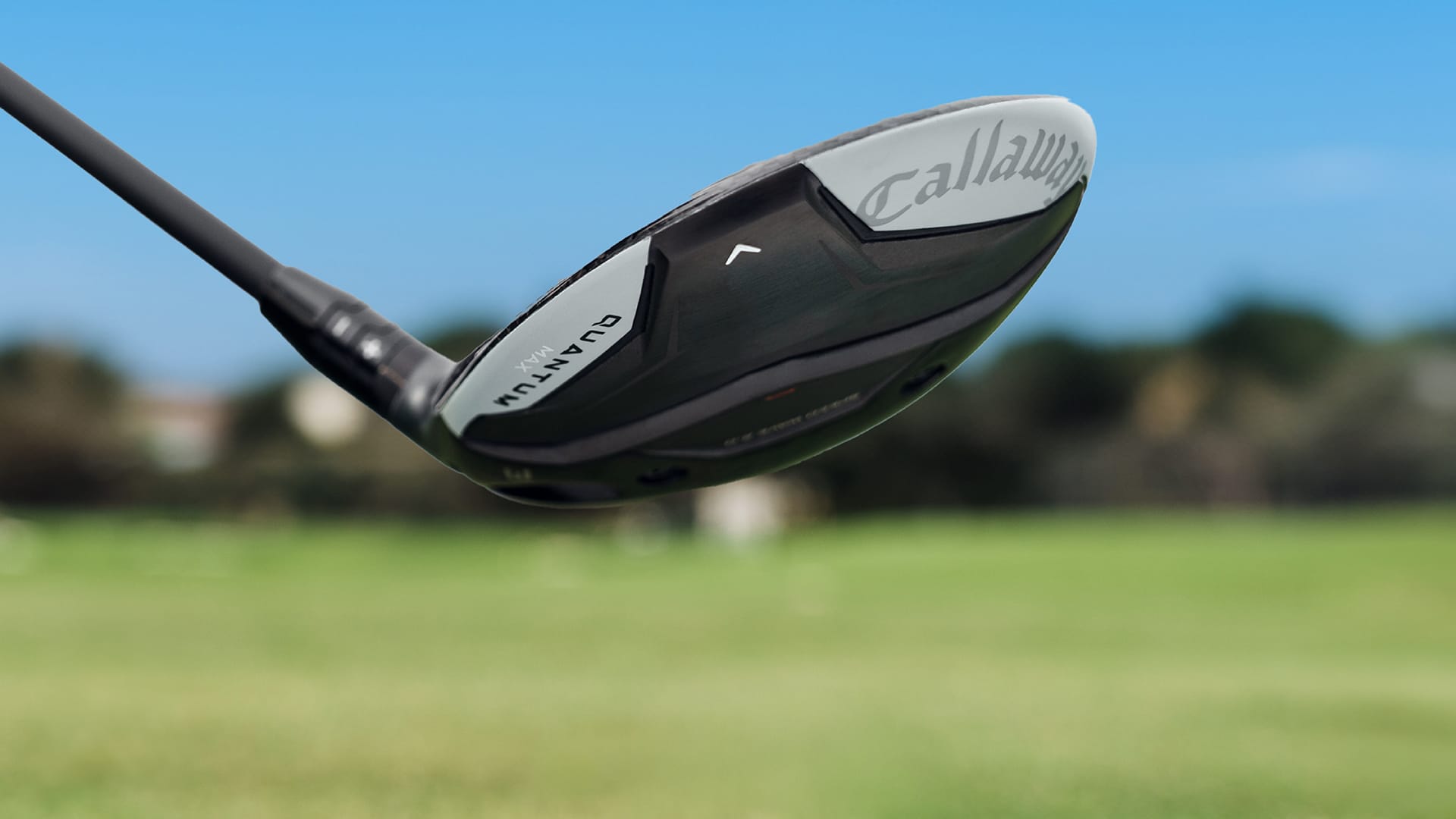 Callaway golf club head on a blurred golf course background