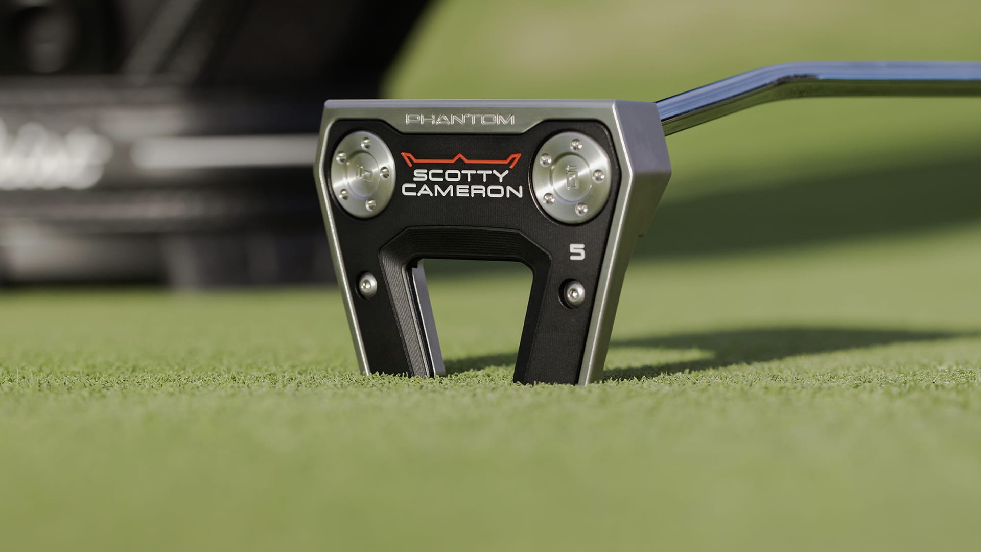 Scotty Cameron putter on a green surface